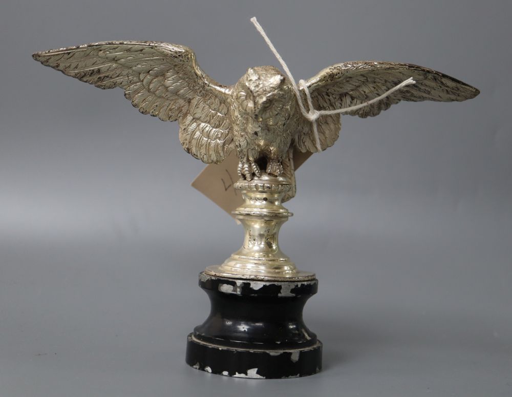 A silvered metal owl car mascot, height 15cm